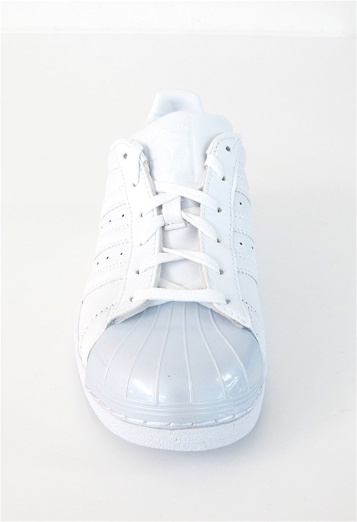 peach and white superstars