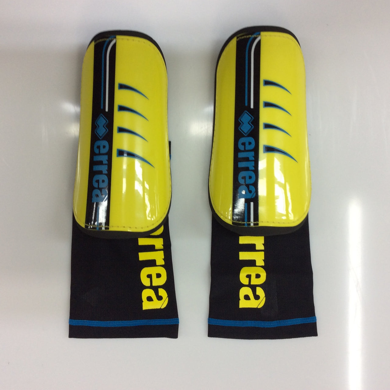 ERREA' SPORT parastinchi calcio adulto modello ELMS colore GIALLO/AZZURRO/NERO tg.UNICA